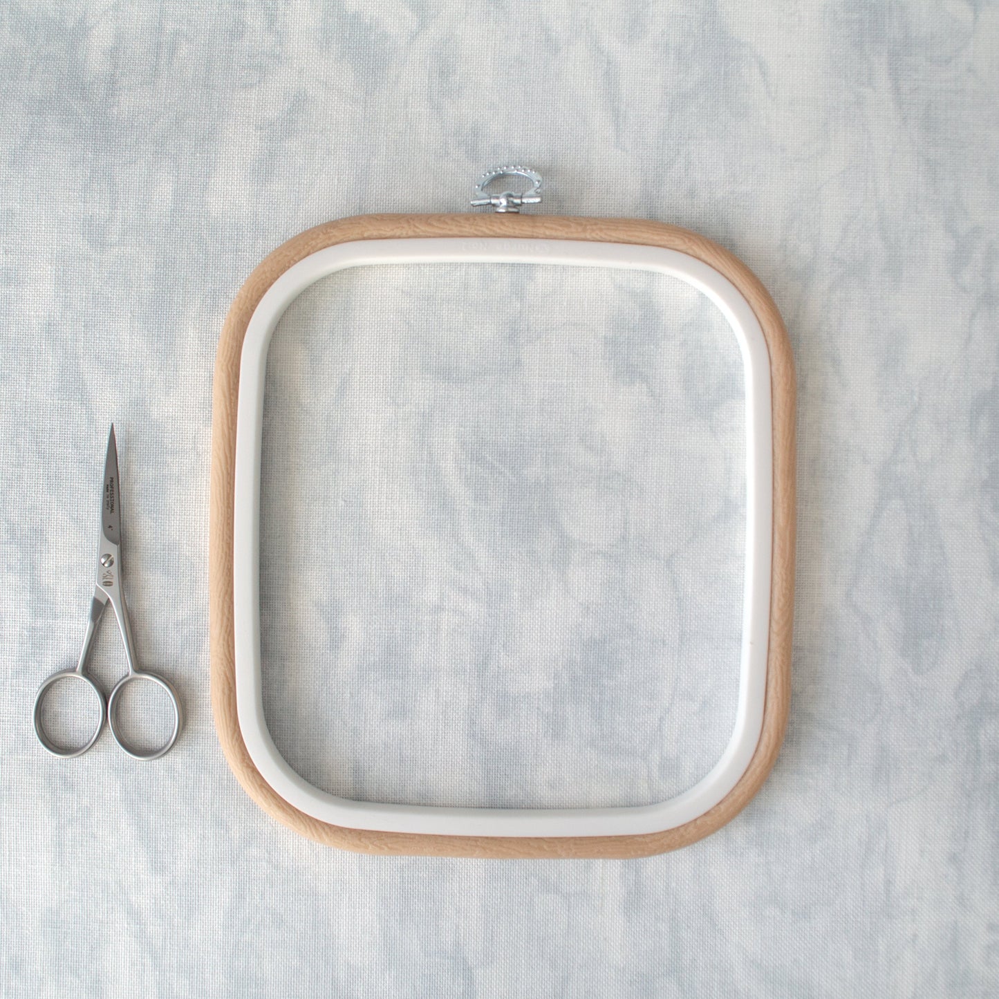 Nurge Square Flexi Hoop Frame in Beige: Elegance and Functionality